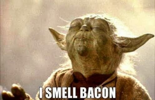 Yoda sniffing the air. Caption: “I smell bacon.”